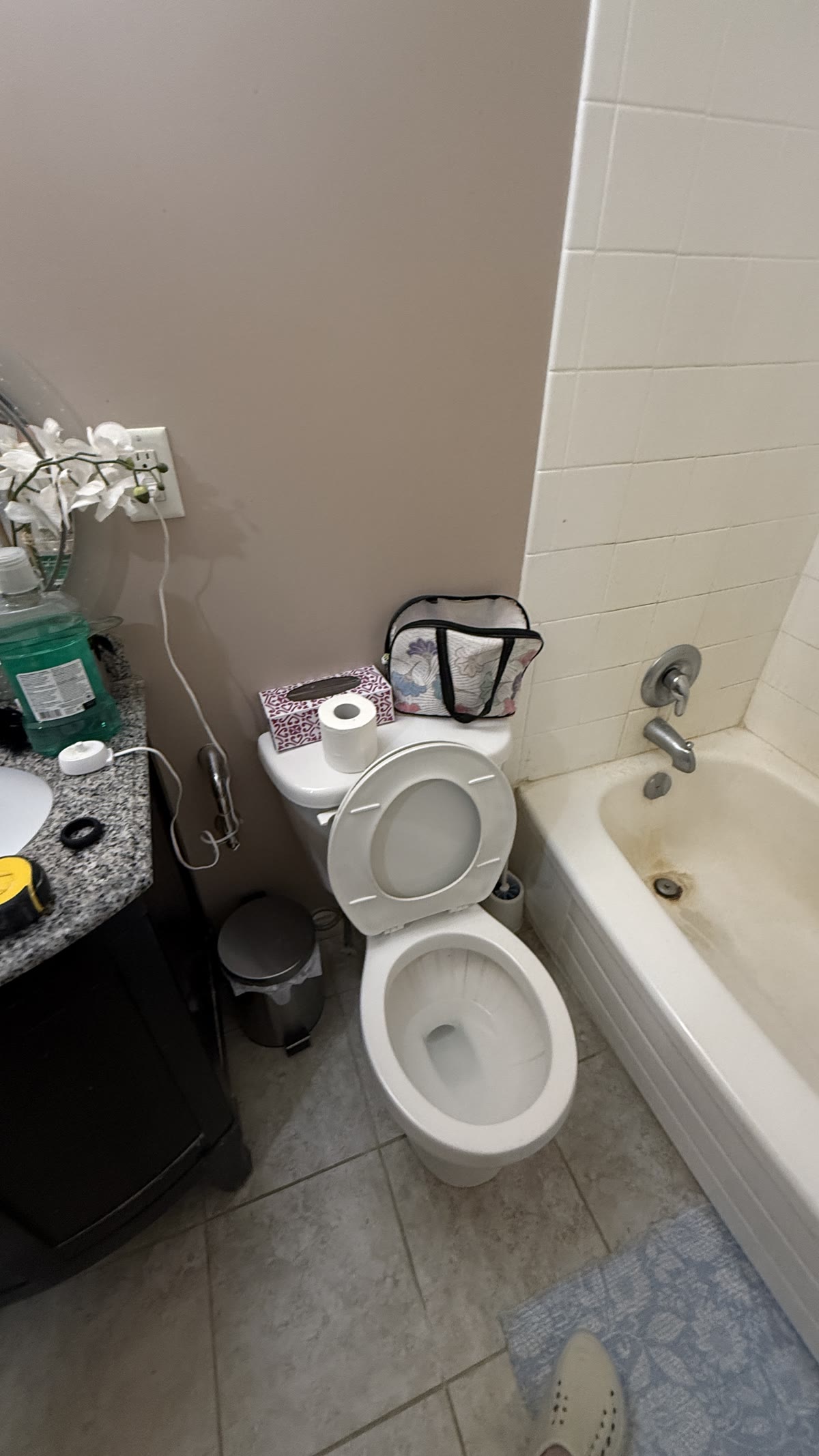 Original compact bathroom layout before renovation in New Westminster